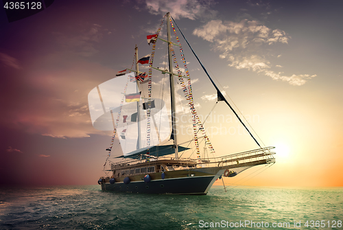 Image of Sailboat and storm clouds