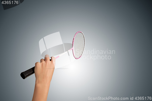Image of Color photo of one racket for badminton