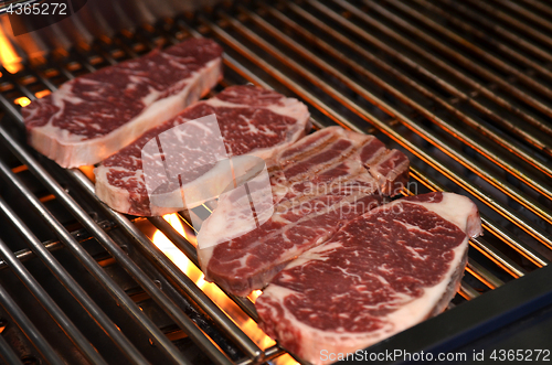 Image of Beef steaks on the grill