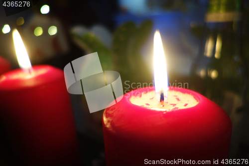 Image of Christmas candle burning at night