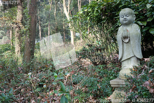 Image of Statue of a cute little Buddha