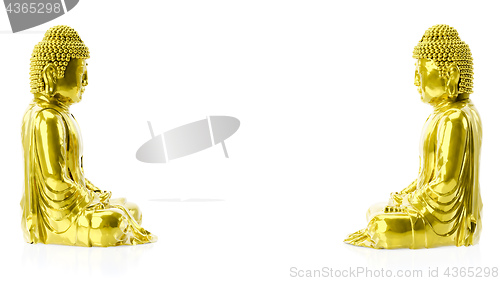 Image of two golden buddha figures with copy space between them
