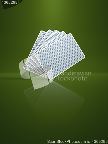 Image of some poker cards on a background green