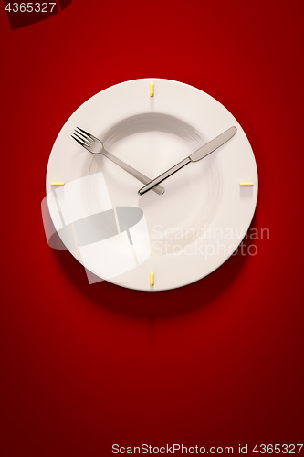 Image of a dish clock on red background