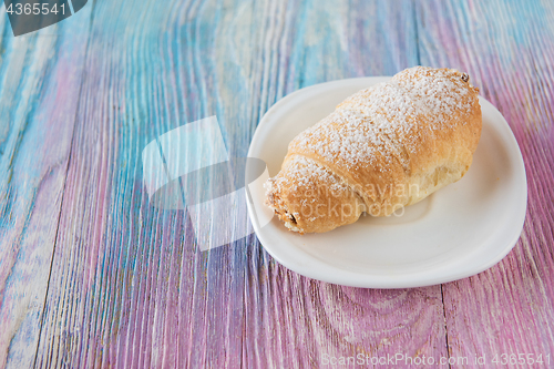 Image of Tasty eclair on plate