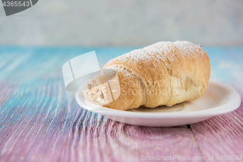 Image of Tasty eclair on plate