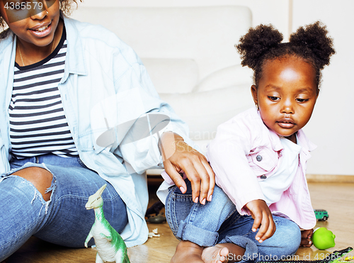 Image of adorable sweet young afro-american mother with cute little daugh