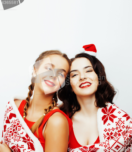 Image of young pretty happy smiling blond and brunette woman girlfriends 