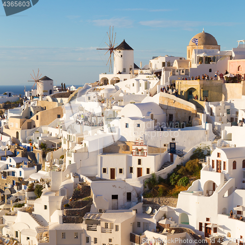 Image of Oia village at sunset, Santorini island, Greece.