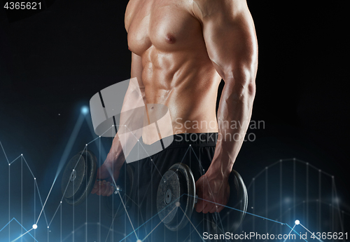 Image of close up of man with dumbbells exercising