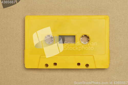 Image of Retro yellow audio tape with