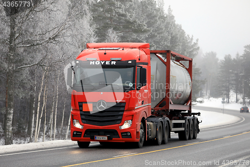 Image of Red Mercedes-Benz Actros Tank Container Transport in Winter