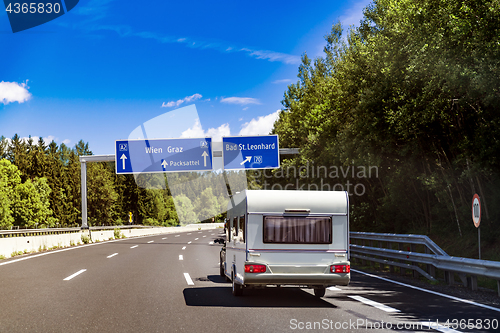 Image of VR Caravan car travels on the highway.