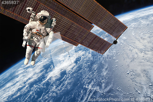 Image of International Space Station and astronaut.