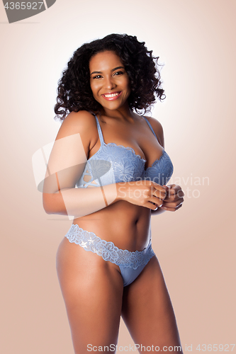 Image of Sexy happy smiling woman in lingerie