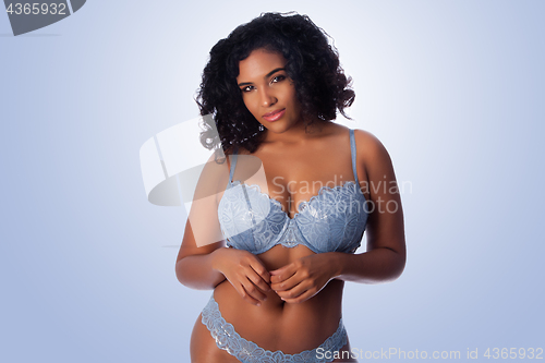 Image of Sexy happy woman in lingerie
