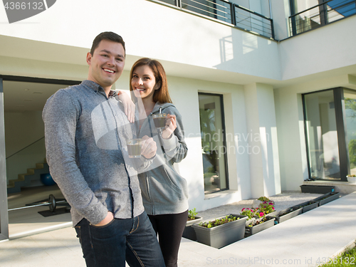 Image of couple enjoying morning coffee