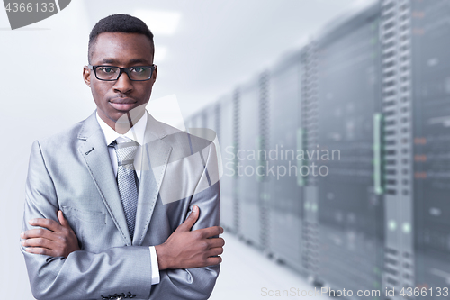 Image of Young black man in server room