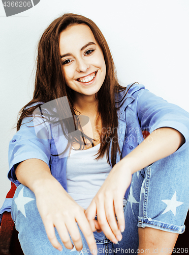 Image of young pretty stylish hipster girl posing emotional isolated on white background happy smiling cool smile, lifestyle people concept close up