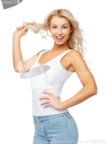 Image of happy smiling young woman with blonde hair