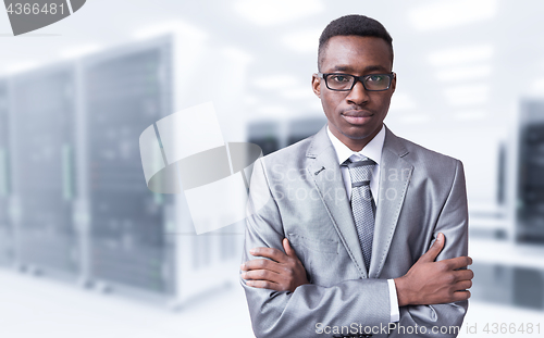 Image of Young black man in server room