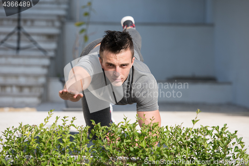 Image of man doing morning yoga exercises