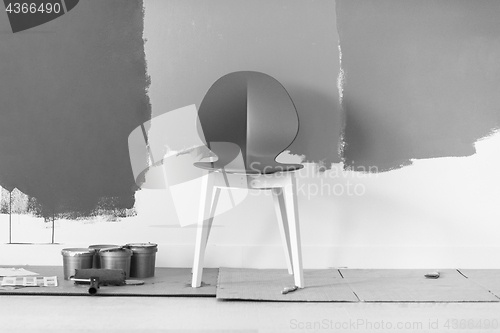 Image of empty chair and equipment for painting