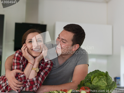 Image of Young couple in the kitchen