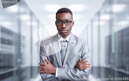Image of Young black man in server room