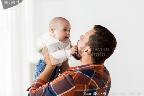 Image of happy little baby boy with father