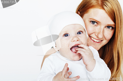 Image of young beauty mother with baby, red head happy family isolated