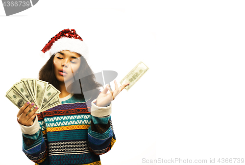 Image of cute young african girl in santas red hat with money isolated