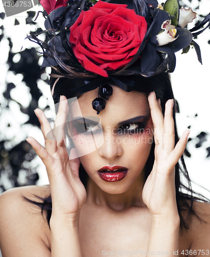 Image of pretty brunette woman with rose jewelry, black and red, bright make up kike a vampire closeup