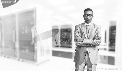 Image of Young black man in server room