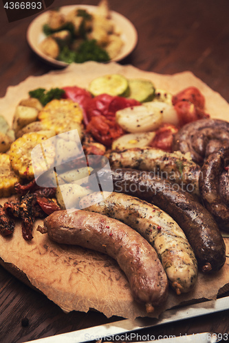 Image of Grilled sausages with vegetables