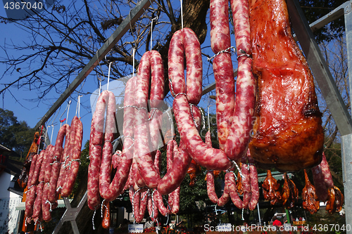 Image of The meat drying outside on the sun