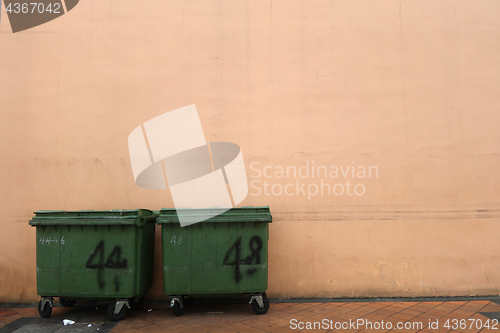 Image of Plastic waste bin on road side 