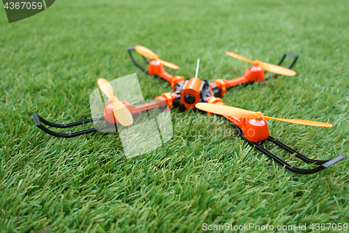 Image of Smart drone on a background of green grass