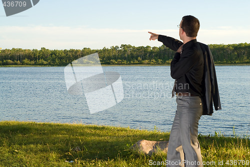 Image of Businessman At The Lake