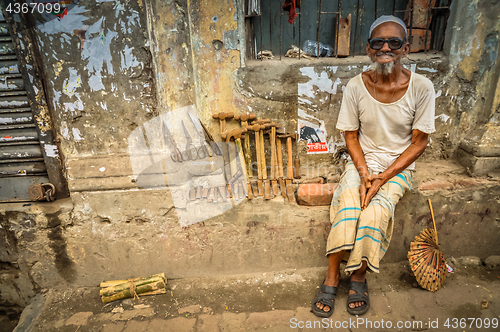 Image of Man with glasses in Bangladesh