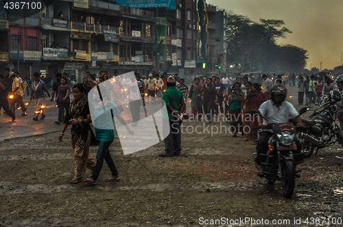 Image of man in centre in Nepal