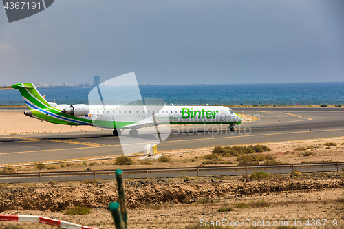 Image of ARECIFE, SPAIN - APRIL, 16 2017: Canadair CRJ-1000 of Binter wit