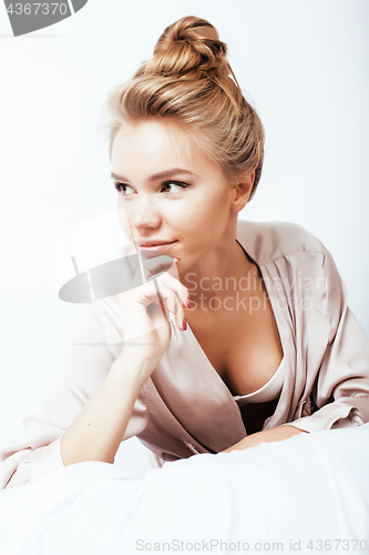 Image of young pretty woman happy smiling, laying in bed, lifestyle people concept