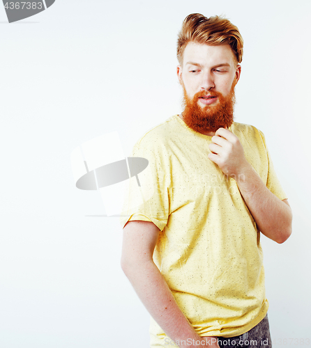 Image of young handsome hipster ginger bearded guy looking brutal isolate