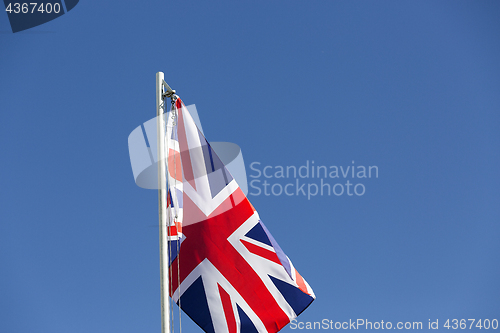 Image of UK flag on a flagpole