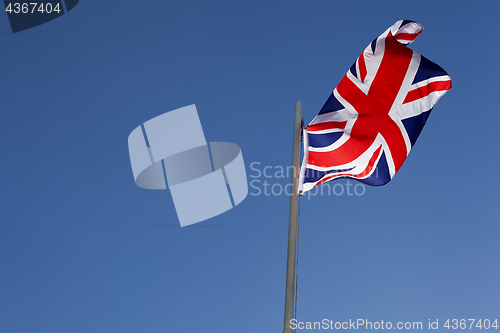 Image of UK flag on a flagpole