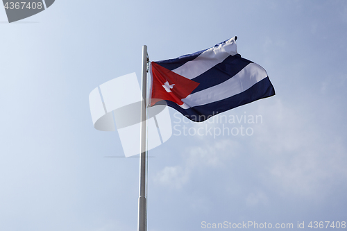 Image of National flag of Cuba on a flagpole