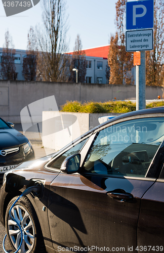 Image of BMW i electric car being charged