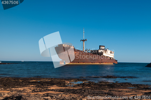 Image of Old rusty boat stranded on the shore in Lanzarote, Canary Island