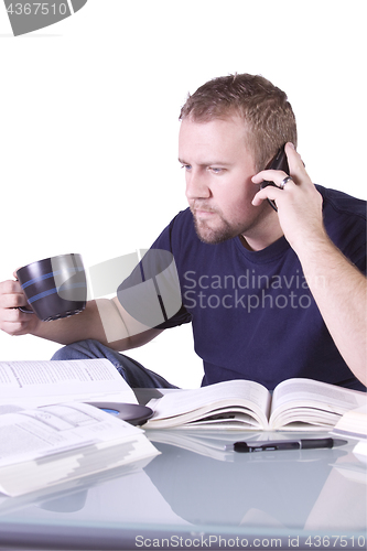 Image of College Student with Books on the Table Studying